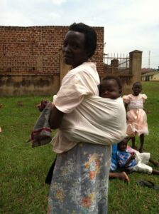 Woman with baby on back-Uganda