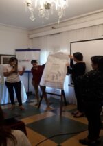 Illustration 1. A working group presenting findings