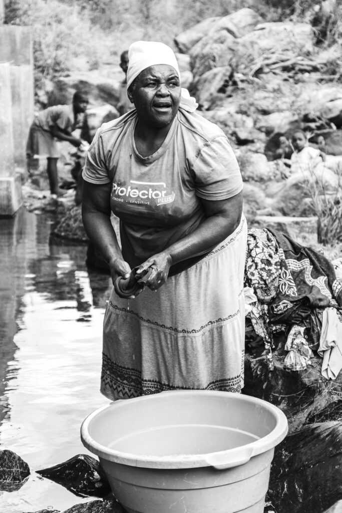 Domestic chores expose women and children to infection with bilharzia as they come into contact with infected water (Photo credit: Gareth Poxon)
