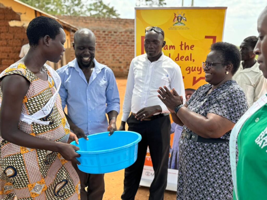 WI-HER not only collaborates with health care providers to understand the drivers of service access and use challenges but also engages directly with the community to create solutions that directly contribute to improved health outcomes, including maternal health. Photo from our community engagement work in Uganda, in which WI-HER’s Joyce Draru hosts a baby shower for new mothers.