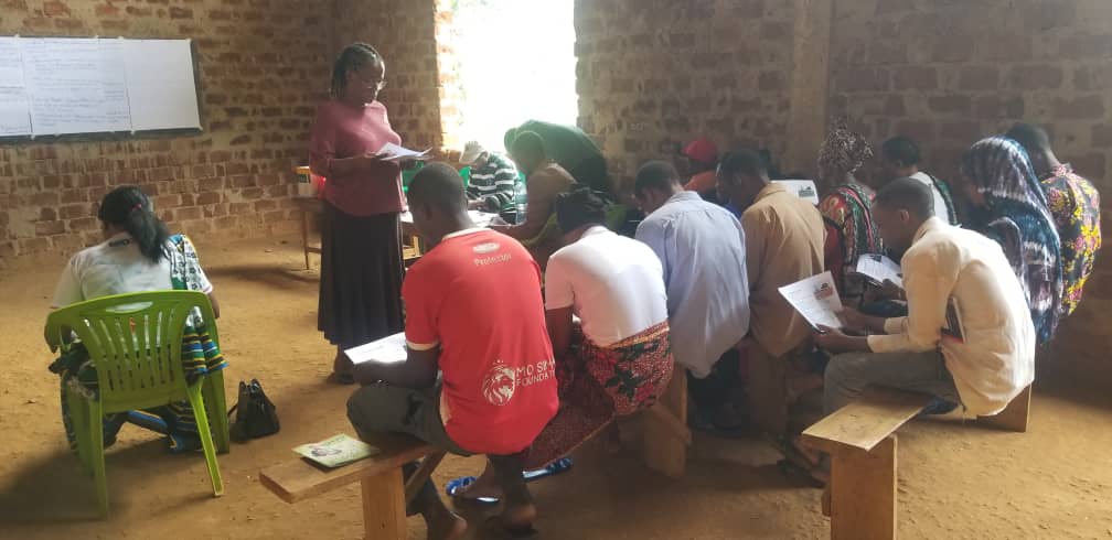 Dr. Stella Mwita meets with community influencers in an effort to design locally relevant solutions that include women and youth in conservation activities.