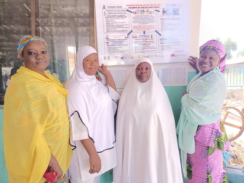 WI-HER GESI Advisor Lydia Musa (left) with health workers who work in GBV prevention and response in Nigeria.